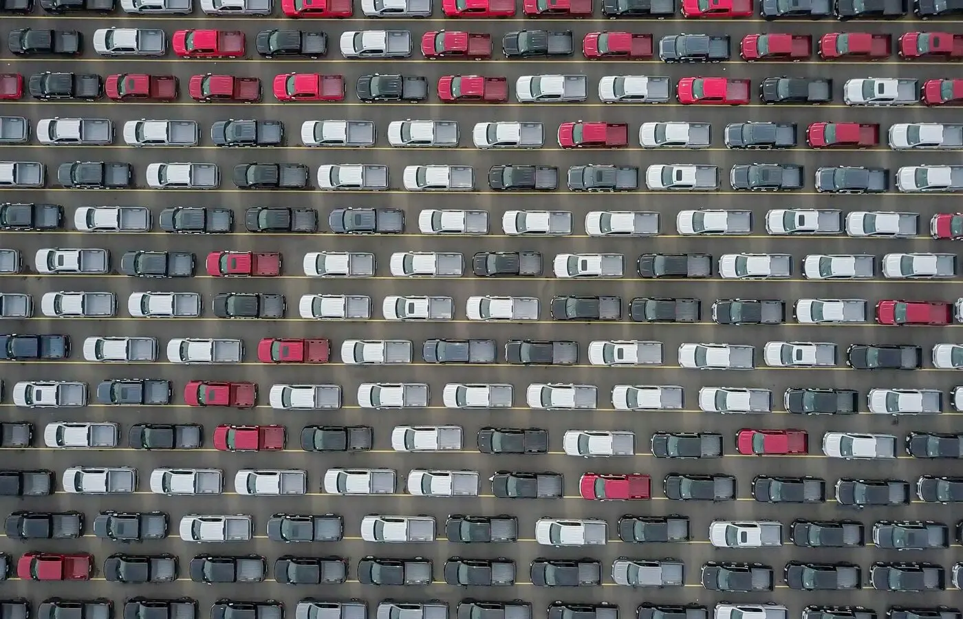 Aerial view of vehicles arranged for fleet inventory reporting